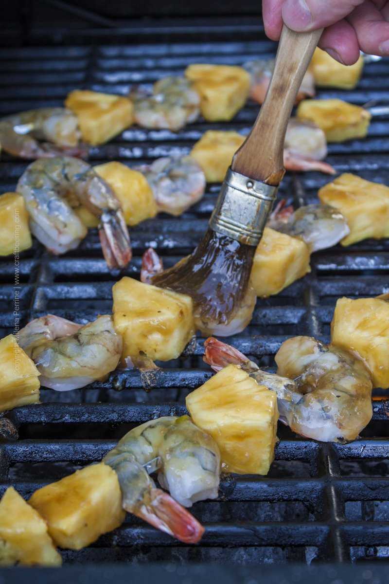 Brushing shrimp & pineapple skewers with IPA Teriyaki. Totally delicious.