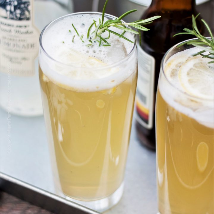 Radler Bier with Pilsner and Sparkling Lemonade. Garnish with rosemary and lemon slices for extra refreshing flavors.