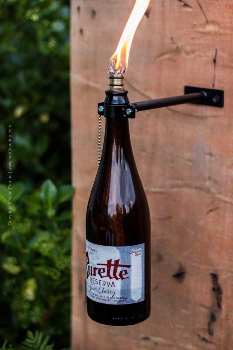 Beer Bottle Tiki Torches - from wall mounted to centerpiece arrangements, they create instant ambiance. Mosquito repellent of epic proportions:) A cool way to recycle (or upcycle:)