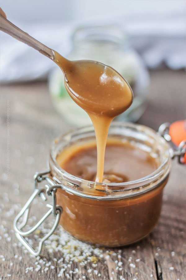 Hops Salted Caramel Sauce dripping from spoon. 