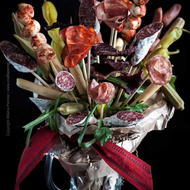 Charcuterie Bouquet. Salami flowers:) and bread sticks for your man. Or woman. Salami bouquet also = a beer lover's dream gift. #beerlovergift #charcuteriebouquet #salamibouquet #ediblebouquet #manflowers
