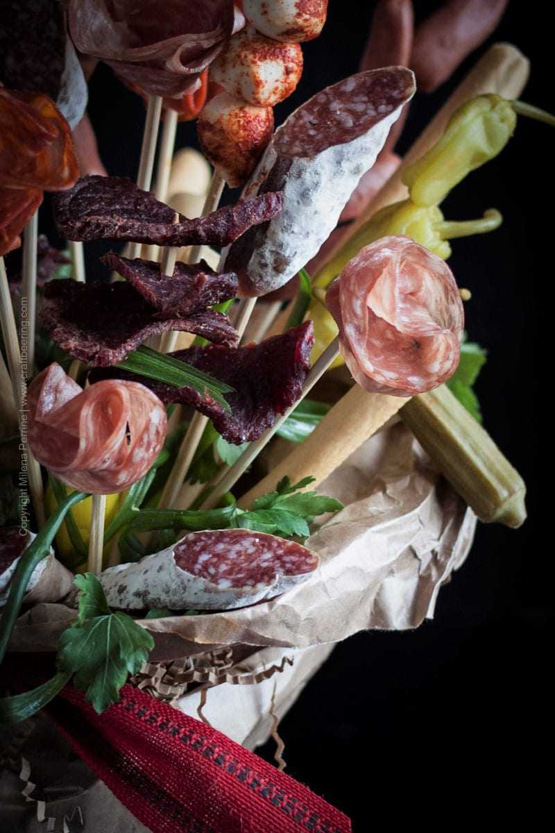 Charcuterie Bouquet. Salami flowers:) and bread sticks for your man. Or woman. A beer lover's dream gift. #beerlovergift #charcuteriebouquet #salamibouquet #ediblebouquet #manflowers