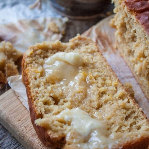 Cooking with Beer & Craft Beer Food Recipes. A slice of Peach Ale Breakfast Loaf smothered in honey butter.