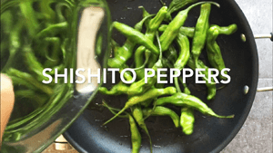 Toss the shishito peppers in the hot oil pan to blister them