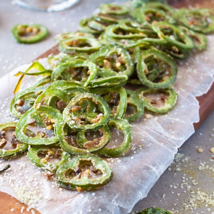 Fried Jalapenos recipe. These fried jalapenos are thinly sliced, lightly dusted with flour then briefly immersed in hot frying oil and finished with hops salt. #friedjalapenos #jalapenos #Jalapenosrecipe