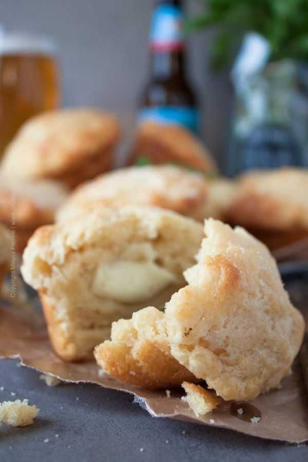 Savory beer muffins with Parmesan in the batter. Delightful airy texture, moist and crusty. Stuffed with Mozzarella and basil. Easy and quick. #beermuffins #easymuffins #beerbattermuffins #beerbread #cookingwithbeer