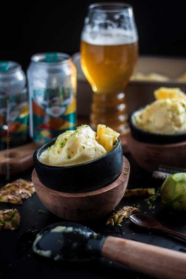 Pineapple sorbet in a bowl with lime zest garnish for extra aroma