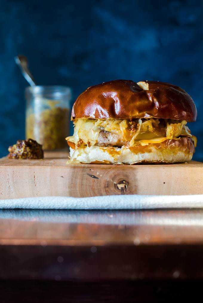 Recipes with Beer | Bratwurst Burger with Beer Braised Onions and Sauerkraut