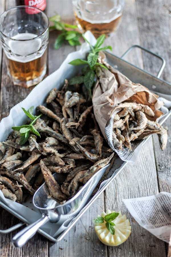 Spanish Fried anchovies, boquerones fritos. Small, crispy salty bites, make a perfect beer snack.