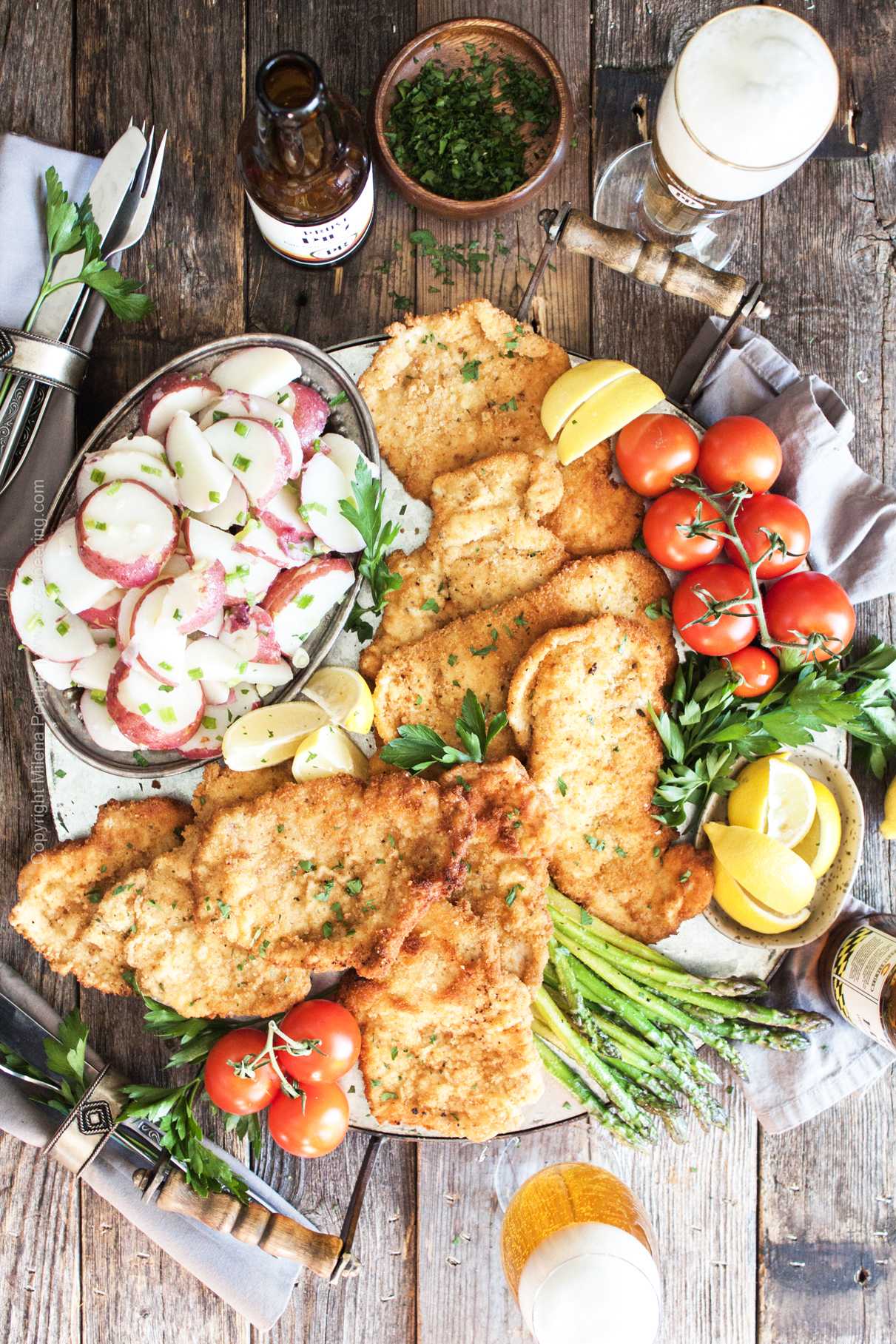 Schnitzel platter - pork and chicken with veggies and potatoes.