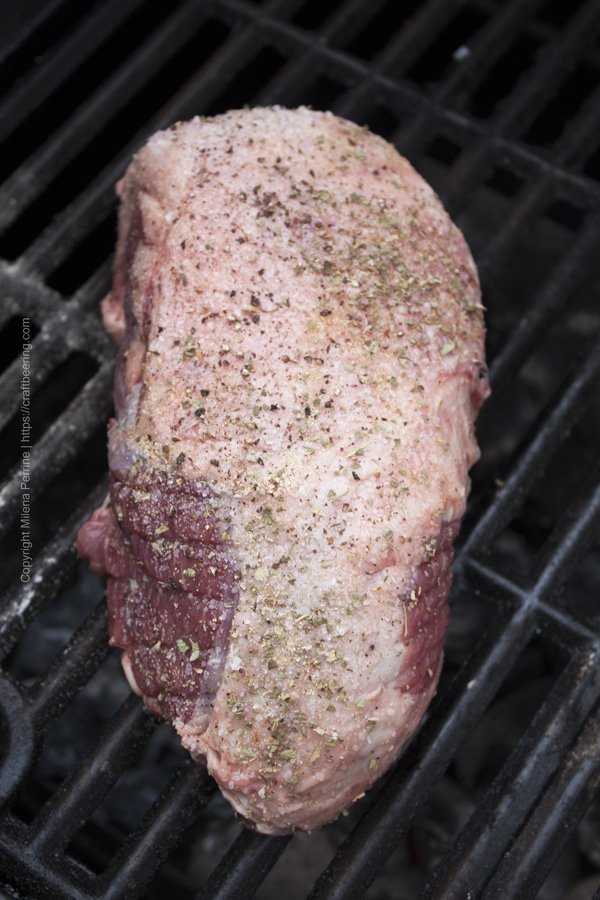 Place leg of lamb with the fat side up directly onto the rack of your grill or smoker.