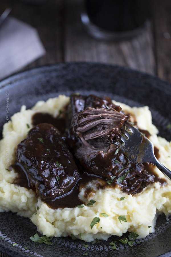 Beer braised short ribs - so tender that the meat is easy to separate without effort , as shown - just using a fork. 