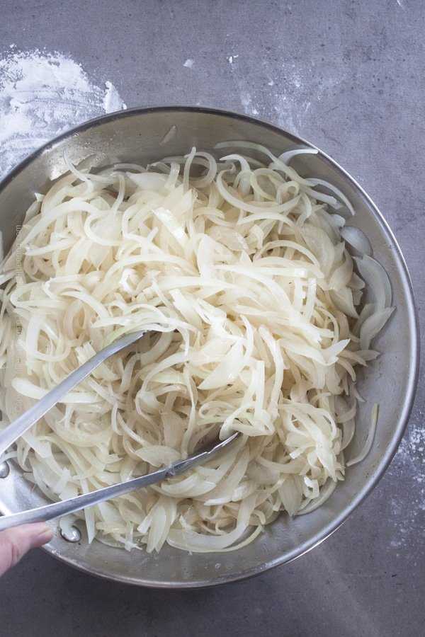 Soften onions for tarte flambee topping