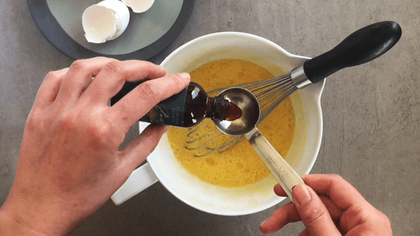 Add vanilla extract to the custard.