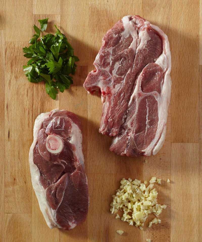 Side by side arm lamb chop and blade lamb chop to illustrate the difference between the two.