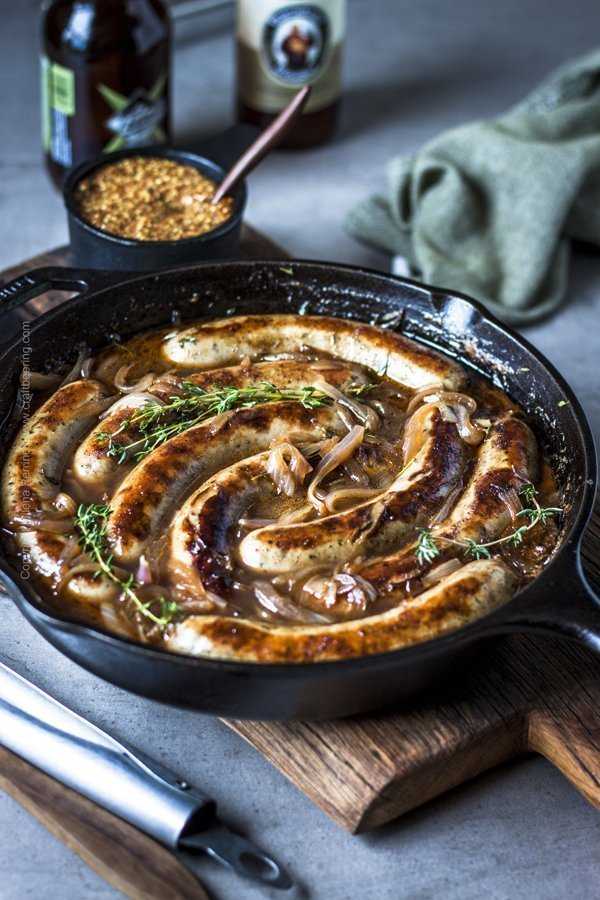 Brats in beer sauce with caramelized onions.