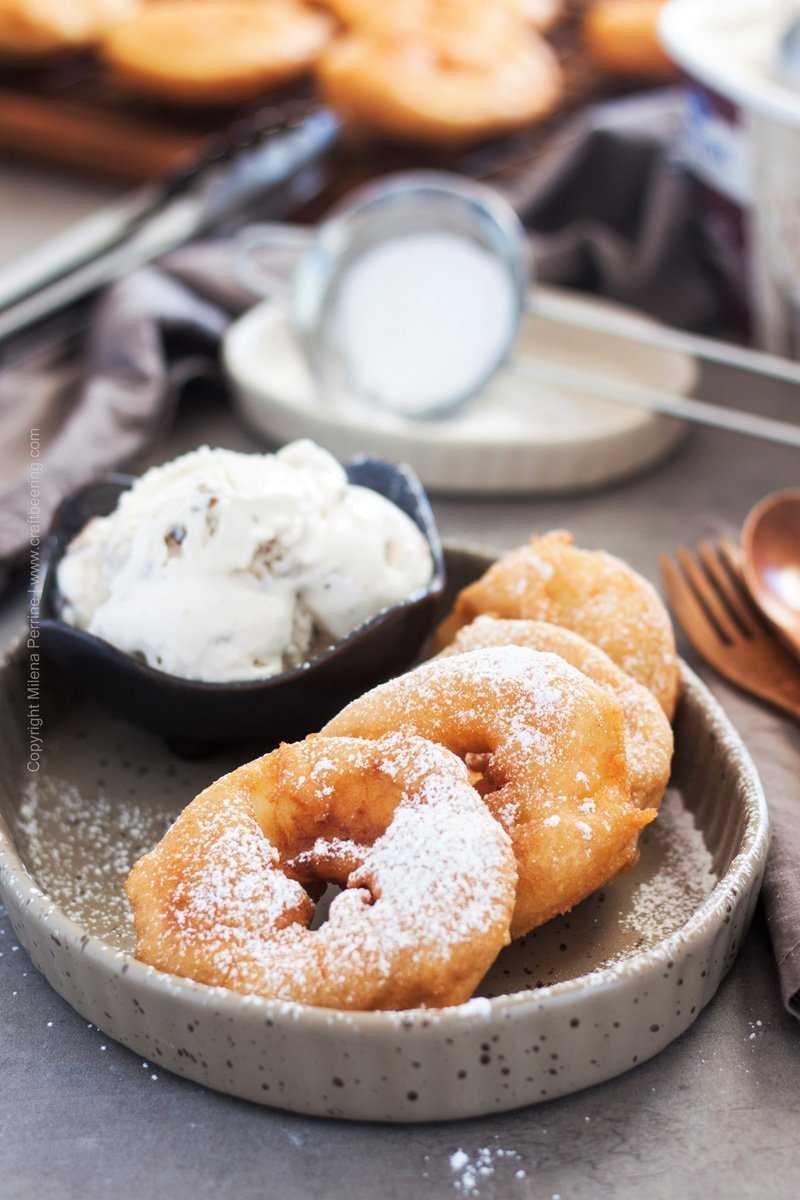 Apple fritters German style - rum soaked apple rings dipped in airy batter and fried to perfection.