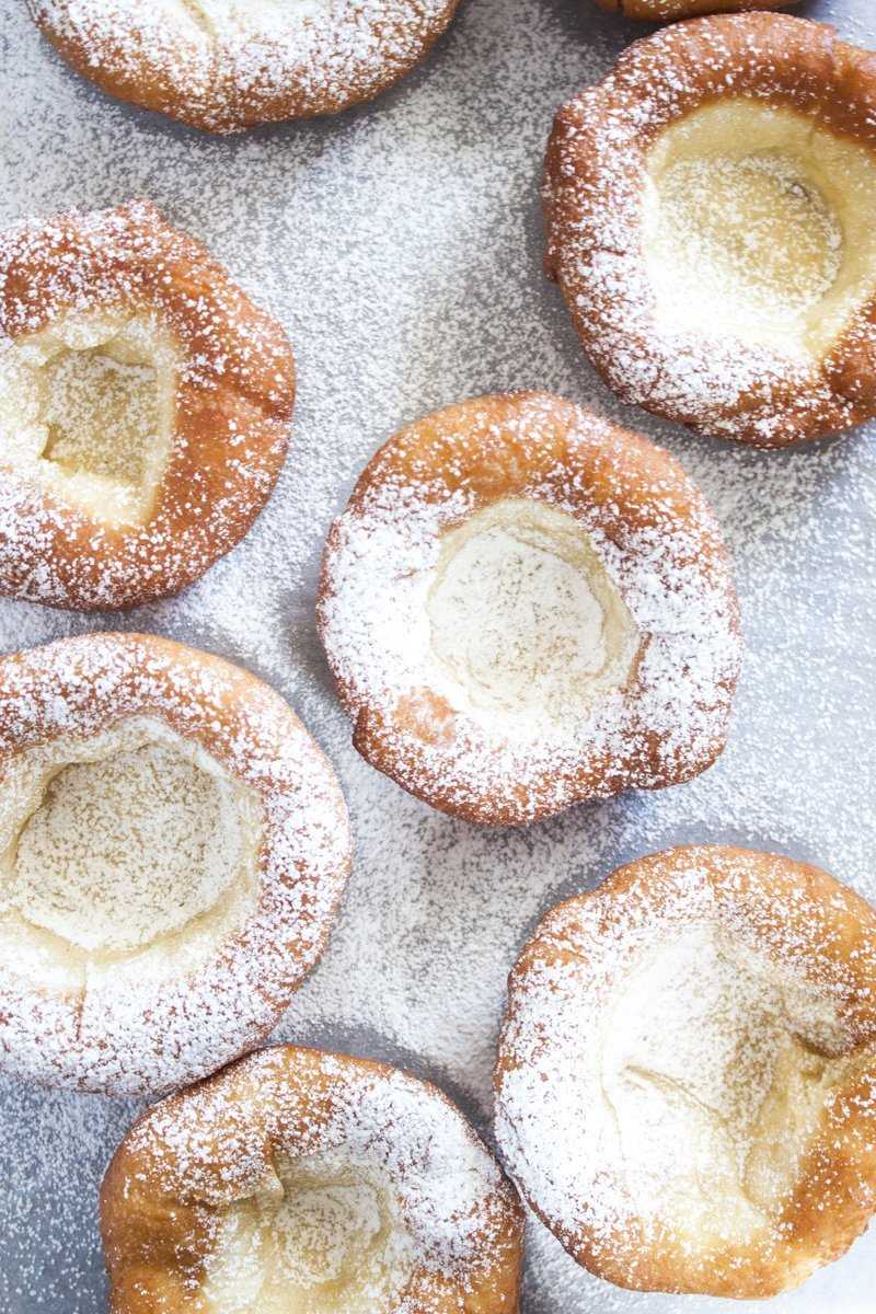 Bavarian donuts with powdered sugar.