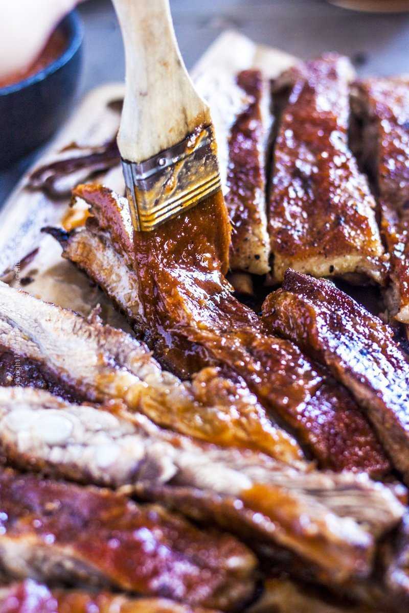 Tender pork spare ribs are brushed with amber lager based beer BBQ sauce.