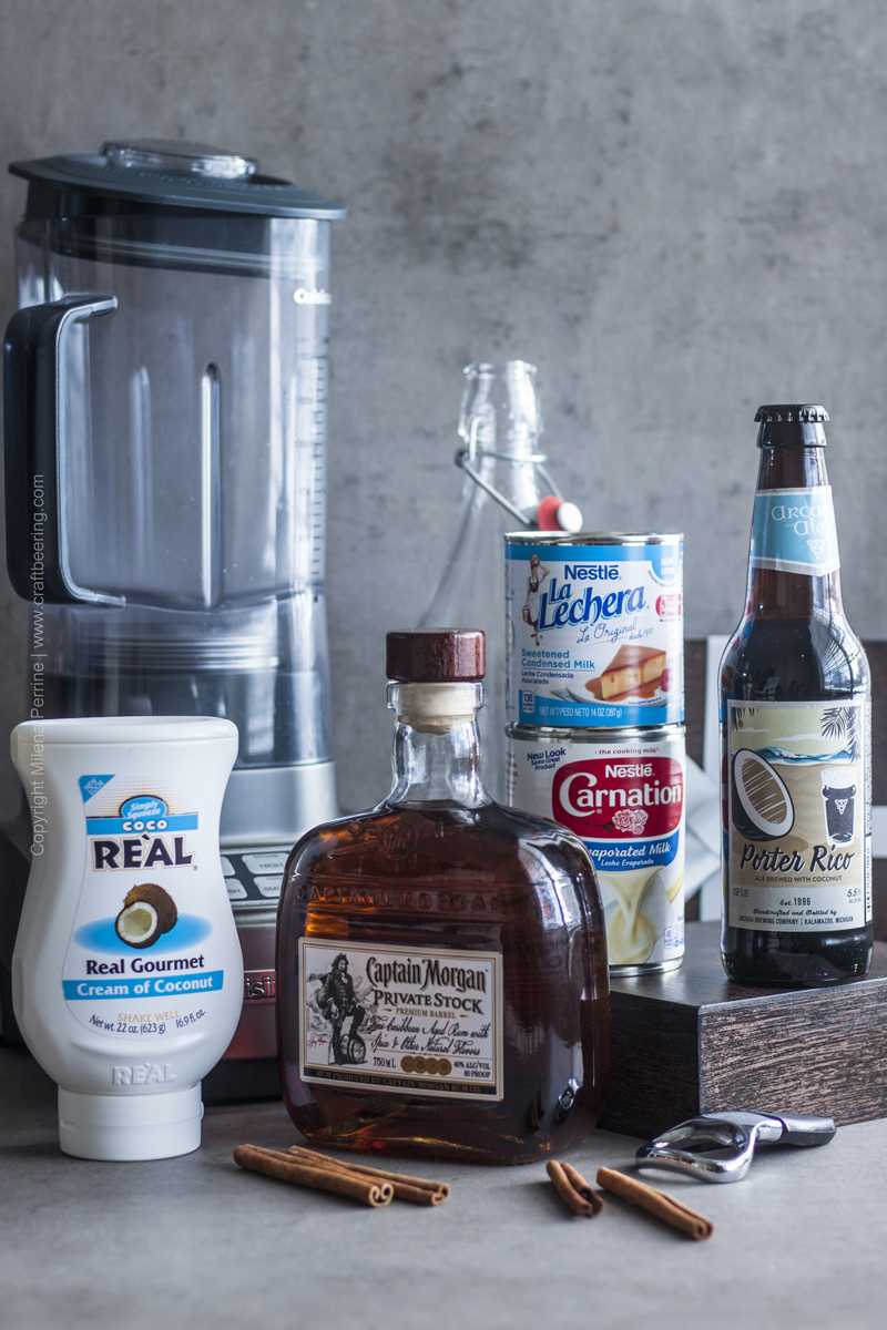 Standard ingredients for coquito with rum plus a coconut porter ale.