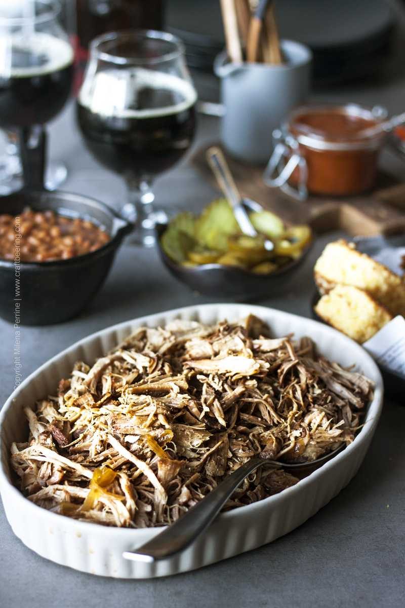 Pulled pork in beer served with corn bread, pickles, jalapenos, BBQ sauce and brown sugar beans. 