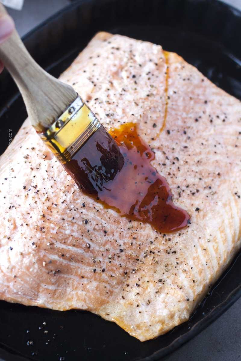 Irish whiskey sauce applied as glaze over partially baked salmon fillet.