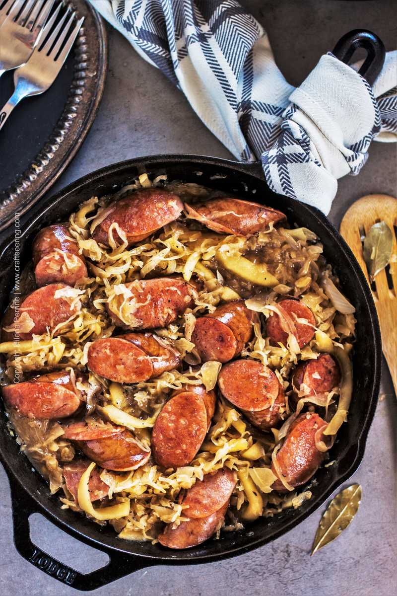 Skillet kielbasa and sauerkraut prepared entirely on the stove top and served family style.