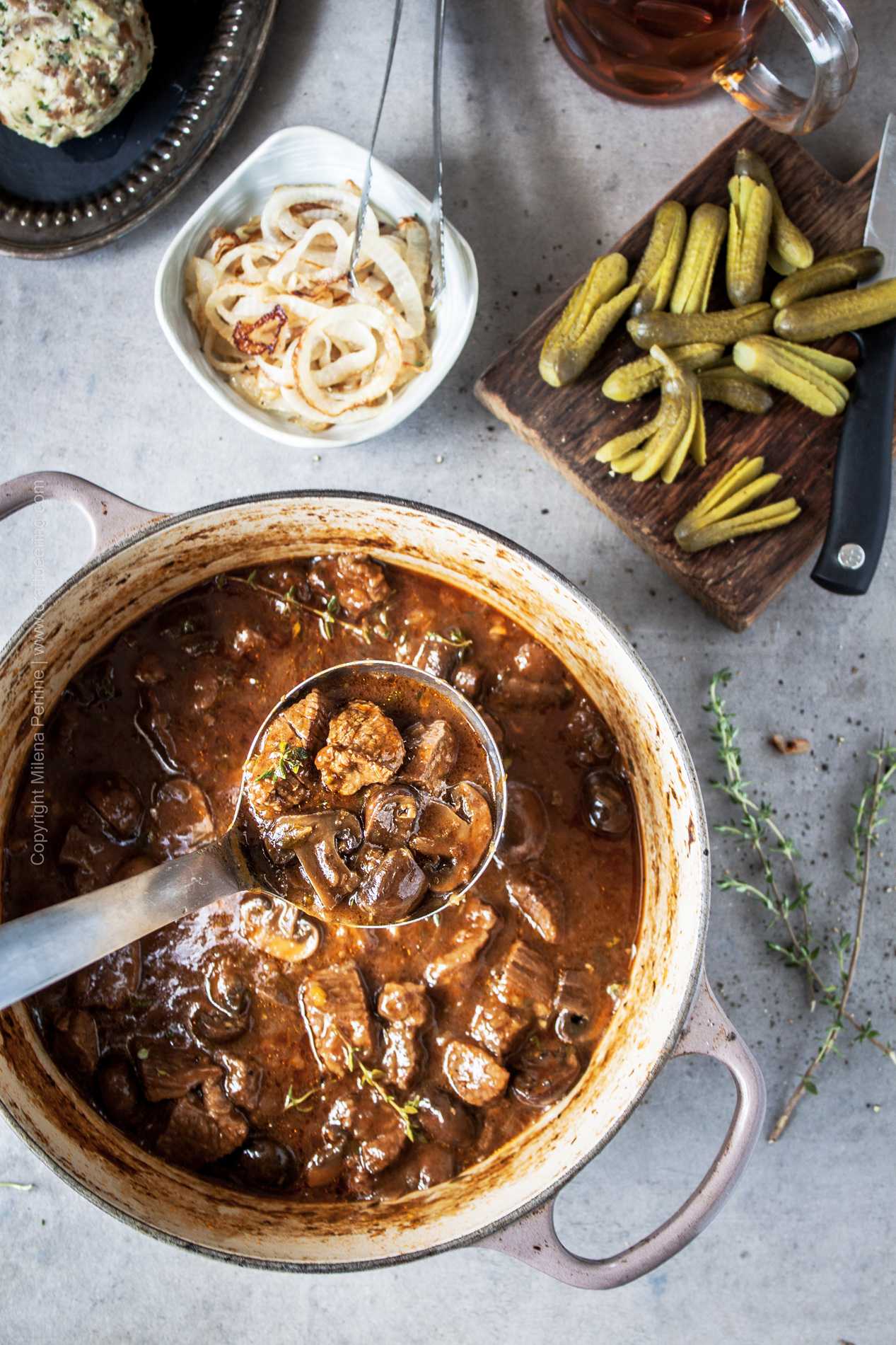 Brisket beef stew with mushrooms and black lager, known as Bierfleisch - a Bavarian classic.