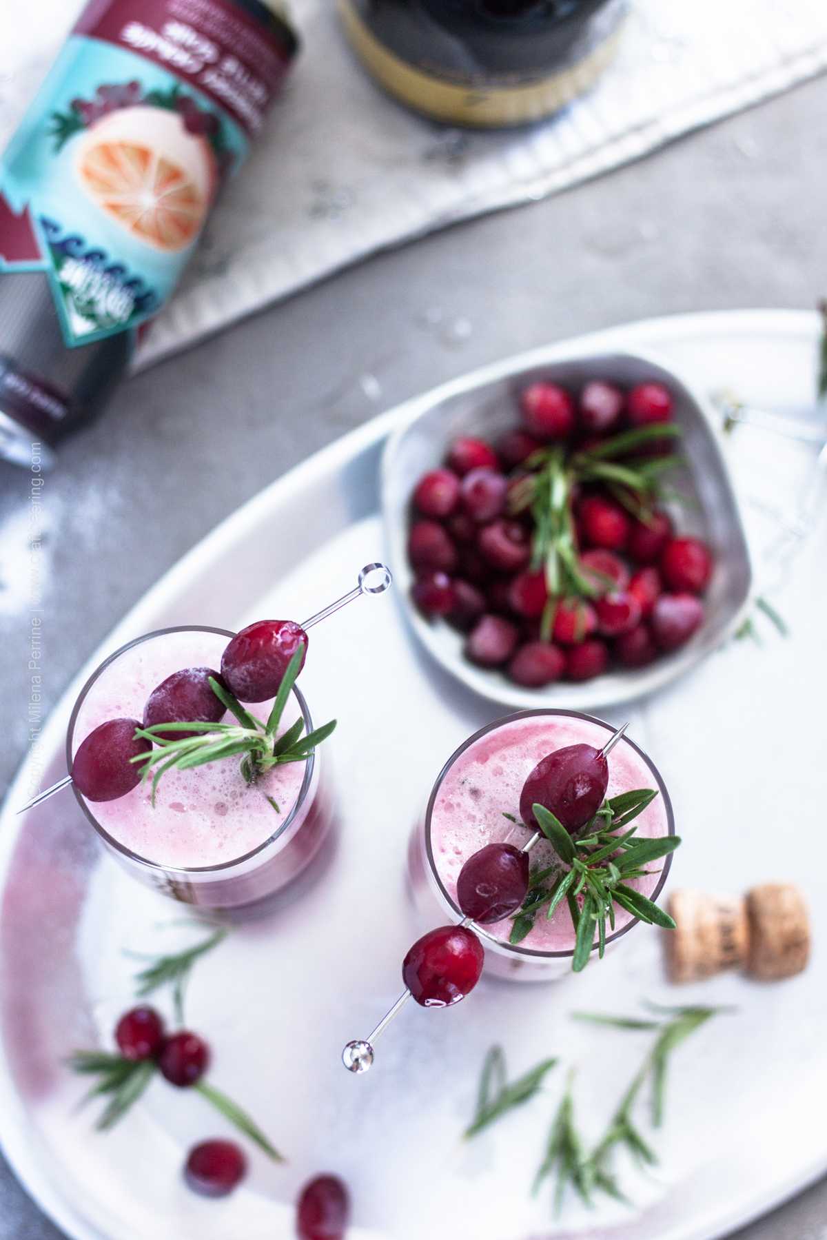 Flavorful cranberry prosecco shandy cocktail - one of the prettiest holiday drinks. 