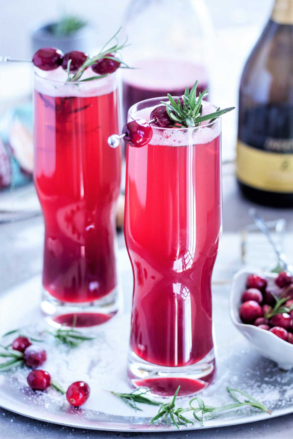 Cranberry Prosecco cocktail with extra flavor from wheat ale or kettle sour. A holiday shandy.