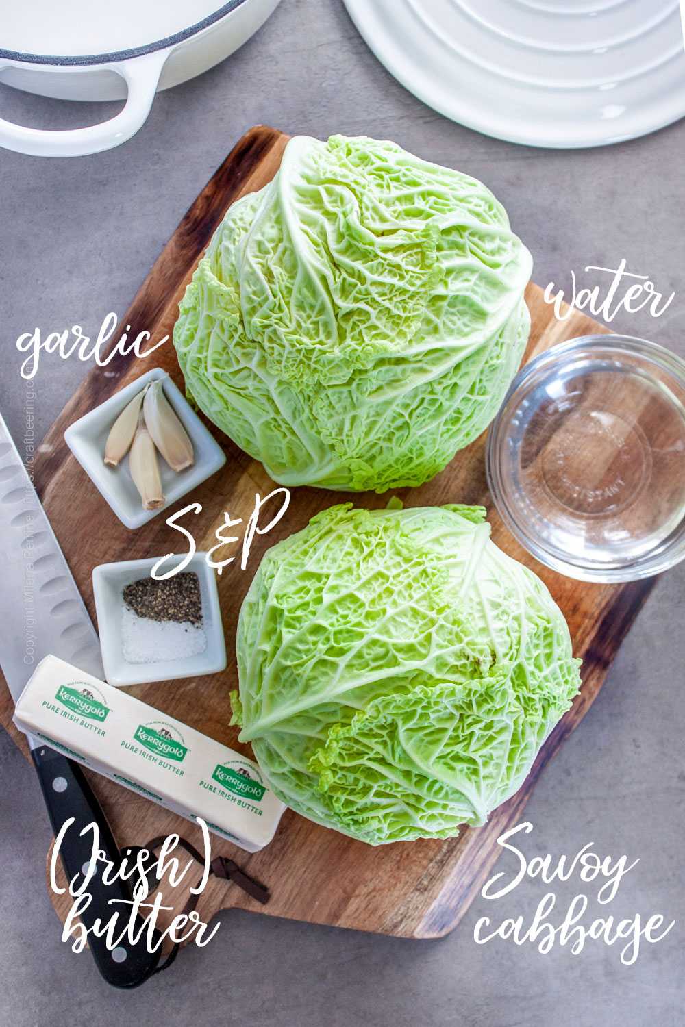 Savoy cabbage, butter, garlic, salt and pepper and water - ingredients for buttered cabbage.