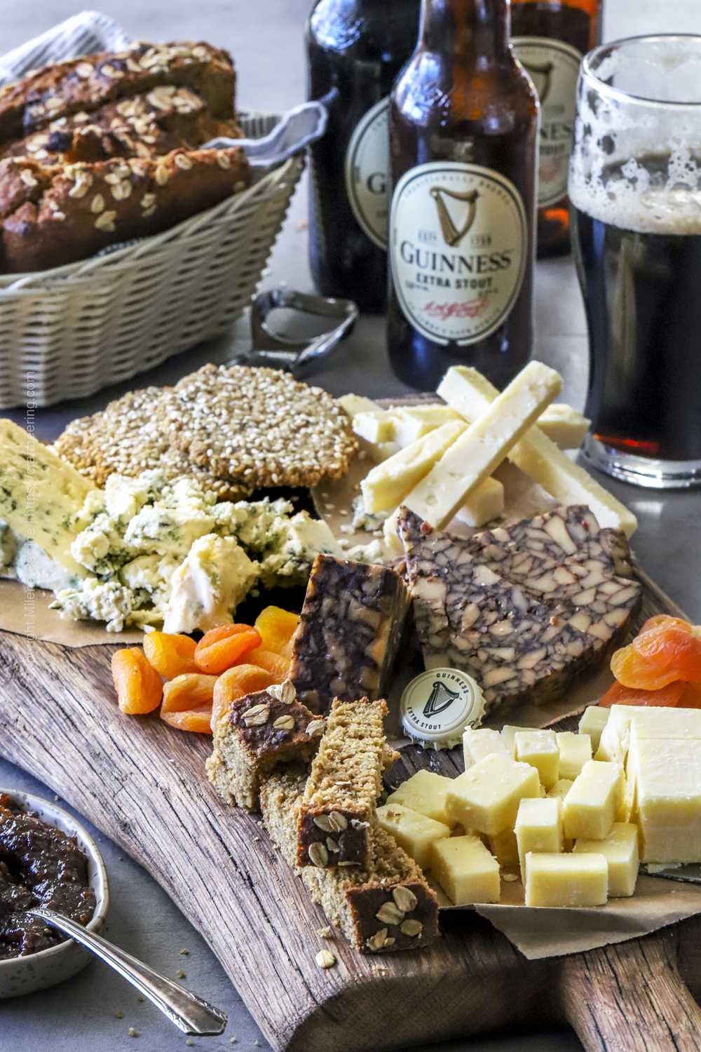 Irish cheese board with oatcakes and Guinness brown bread in addition to a genuine cheese selection, dried apricots and fig chutney.