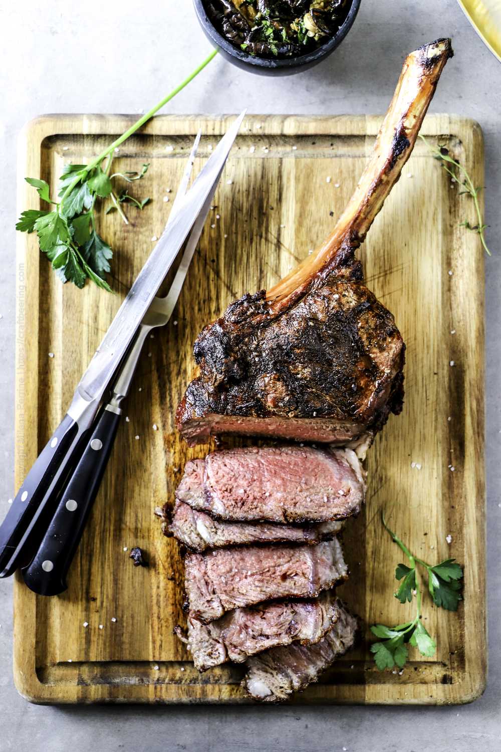 Perfect tomahawk steak - medium rare, juicy meat and nicely seared outside.