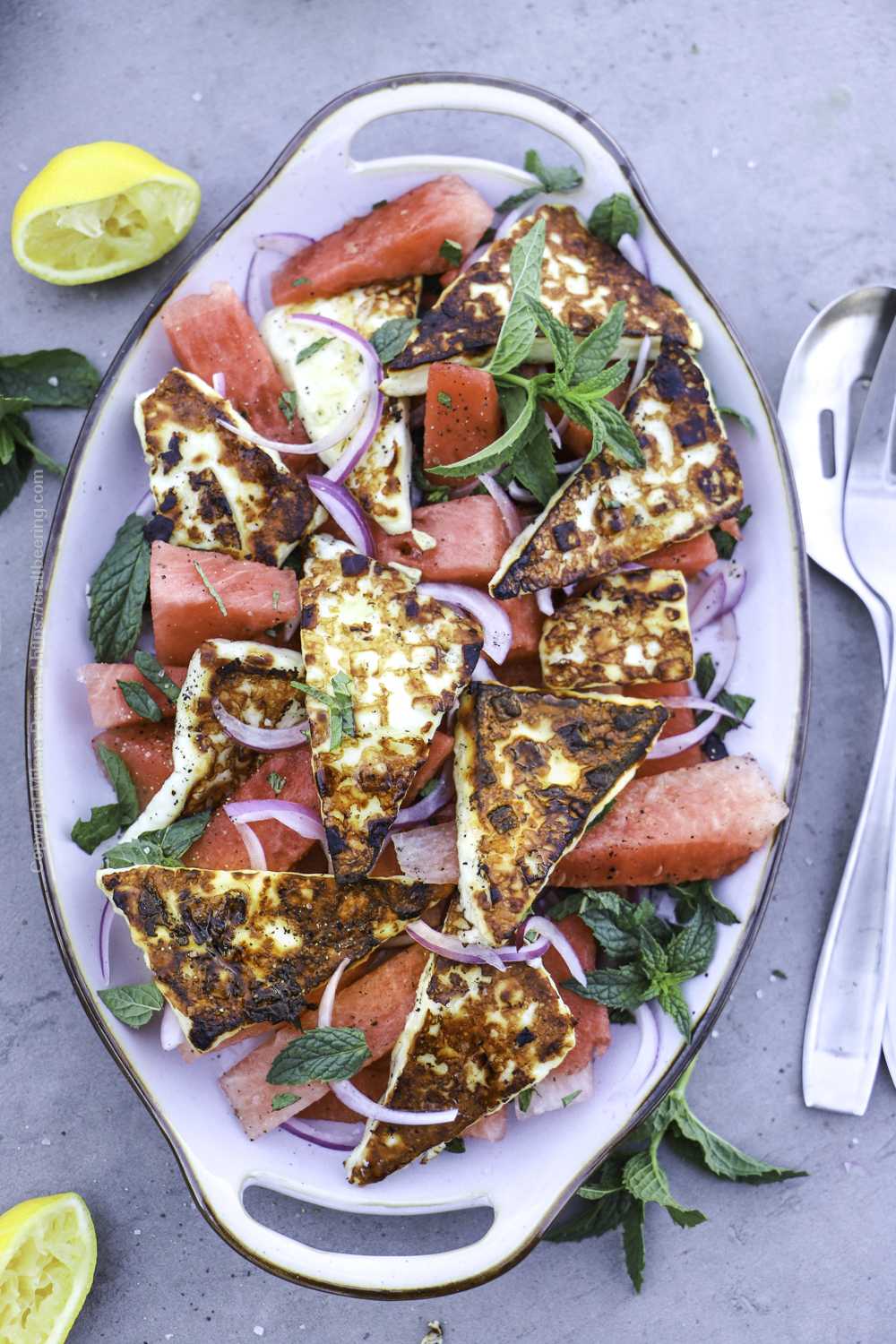 Grilled halloumi cheese salad with feta and mint