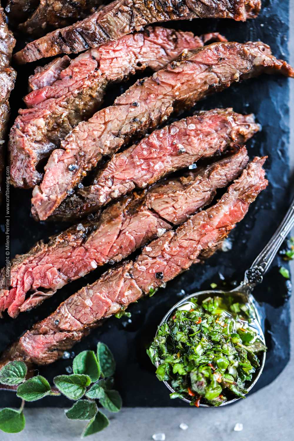 Grilled skirt steak (outside cut) Argentinian style with chimichurri.
