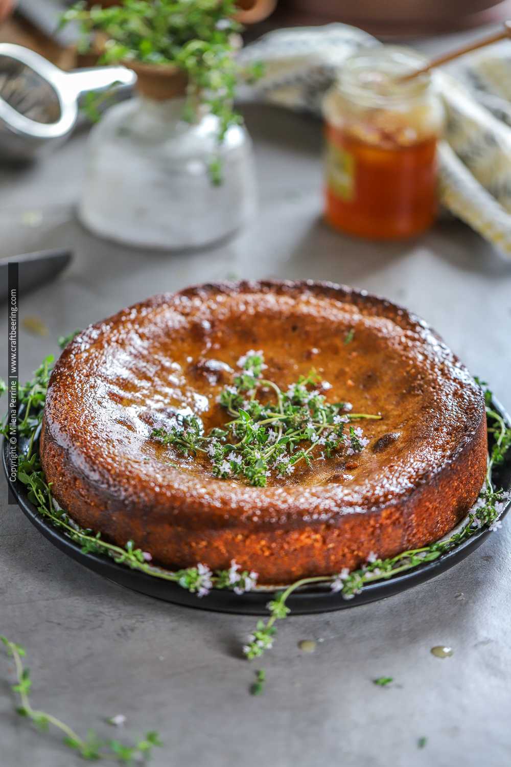 Honey cake with almond flour and polenta and thyme infused honey syrup