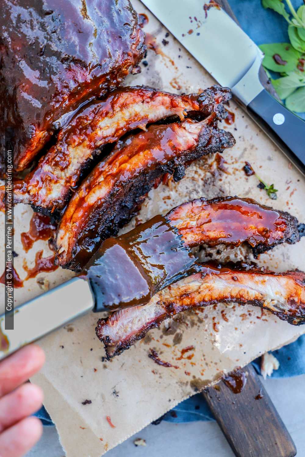 Smoked baby back ribs with barbecue sauce. 