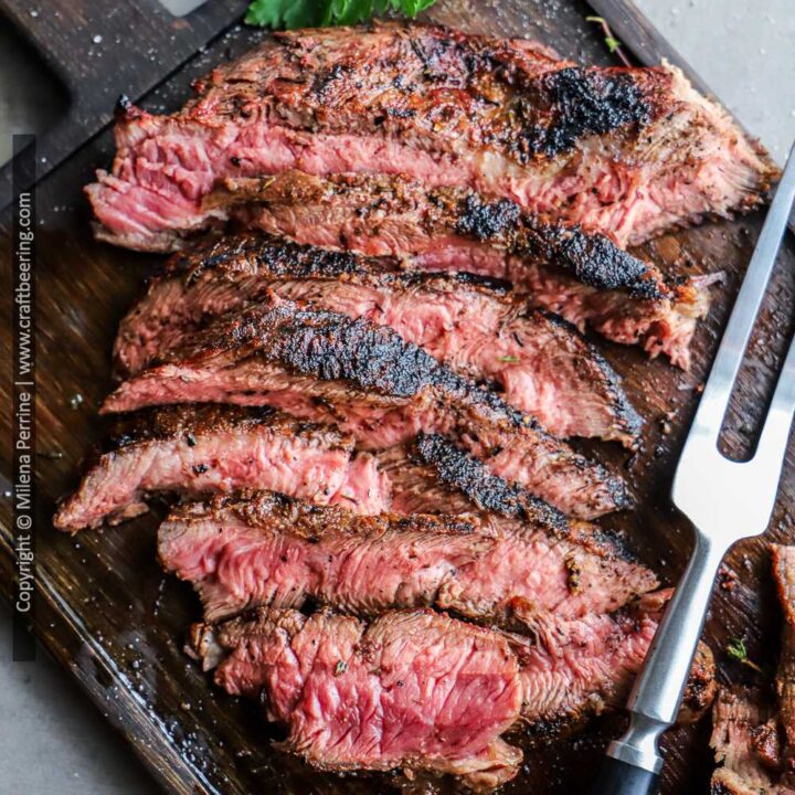 Grilled flat iron steak medium-rare.