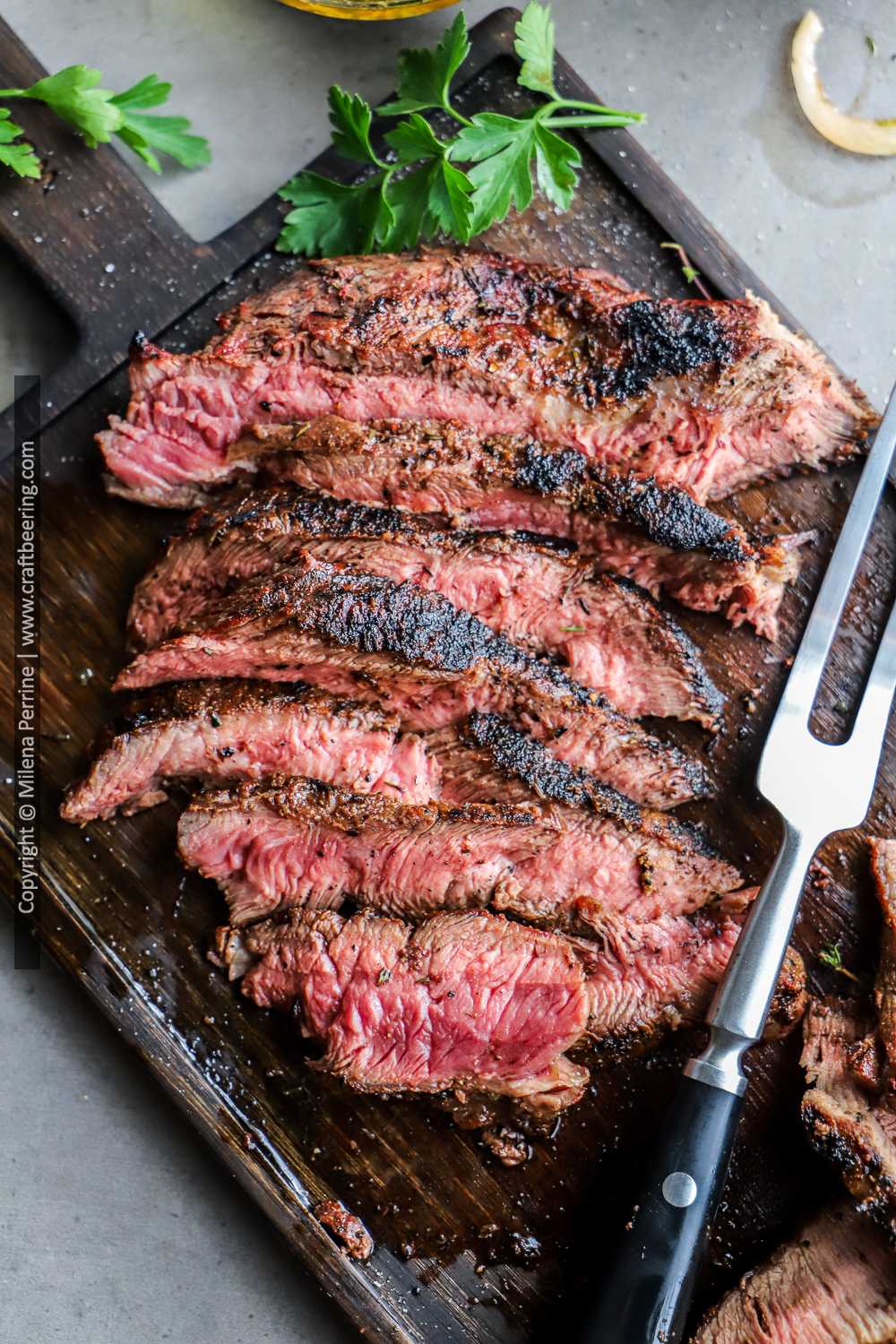 Grilled flat iron steak medium-rare.