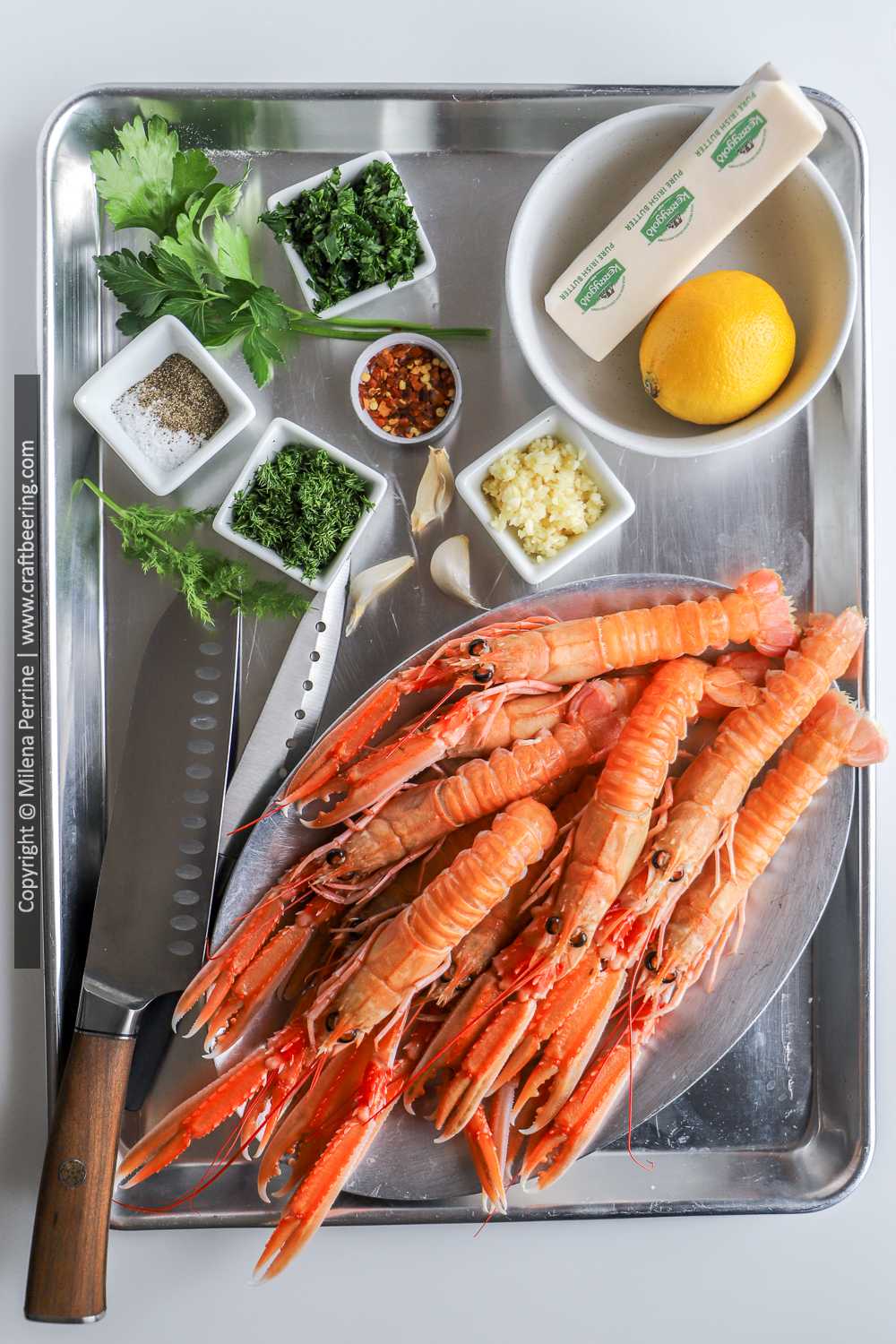 Raw langoustine scampi with ingredients for compound butter. 