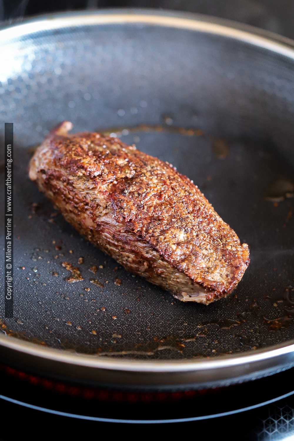 Hybrid cast iron skillet petite filet (teres major steak).