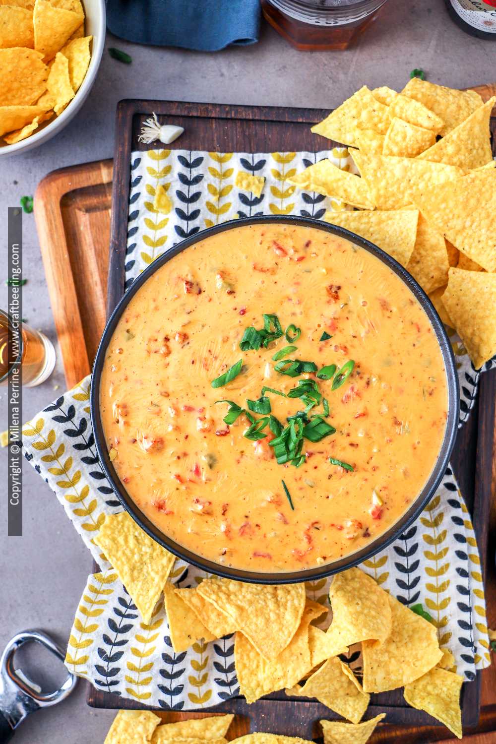 Smoked queso dip - chile con queso with chorizo has been infused with savory and sweet hickory wood notes. 