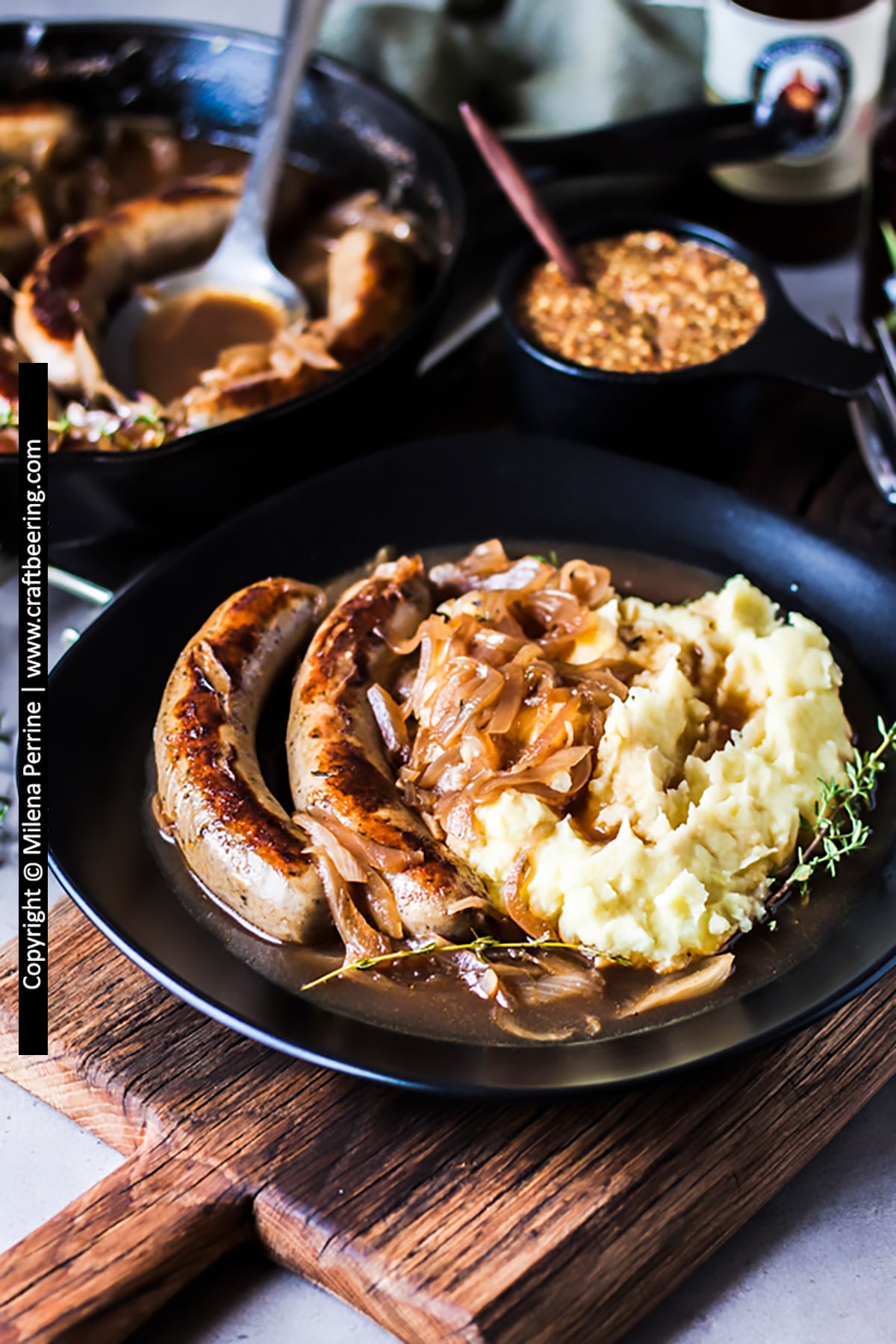 Cooking bratwurst with beer and serve with mashed potatoes.
