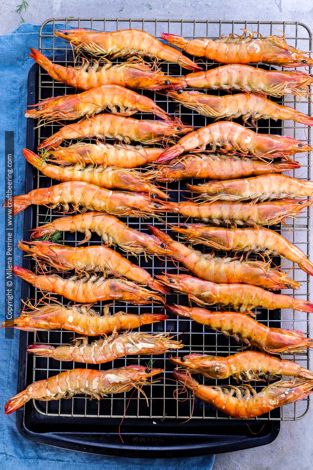 Smoked shrimp displayed on cooling rack.