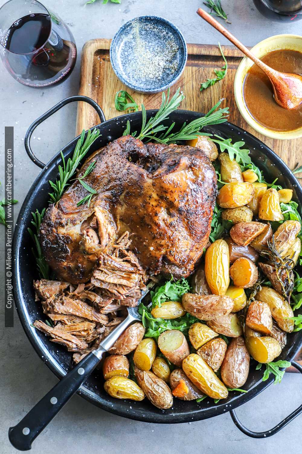 Platter with leg of lamb crock pot roast and potatoes. 