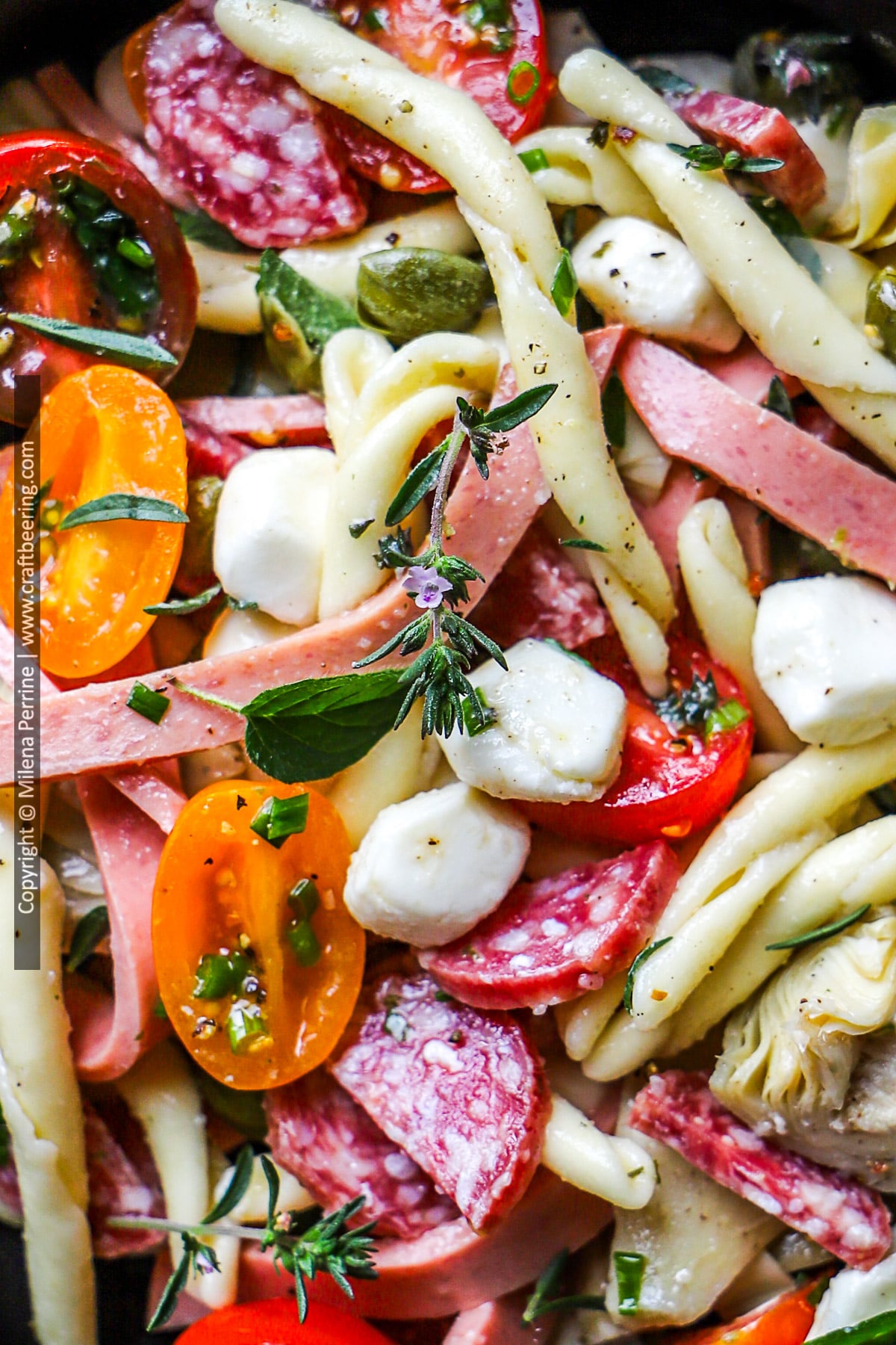 A zoom in shot from above of antipasto pasta salad.