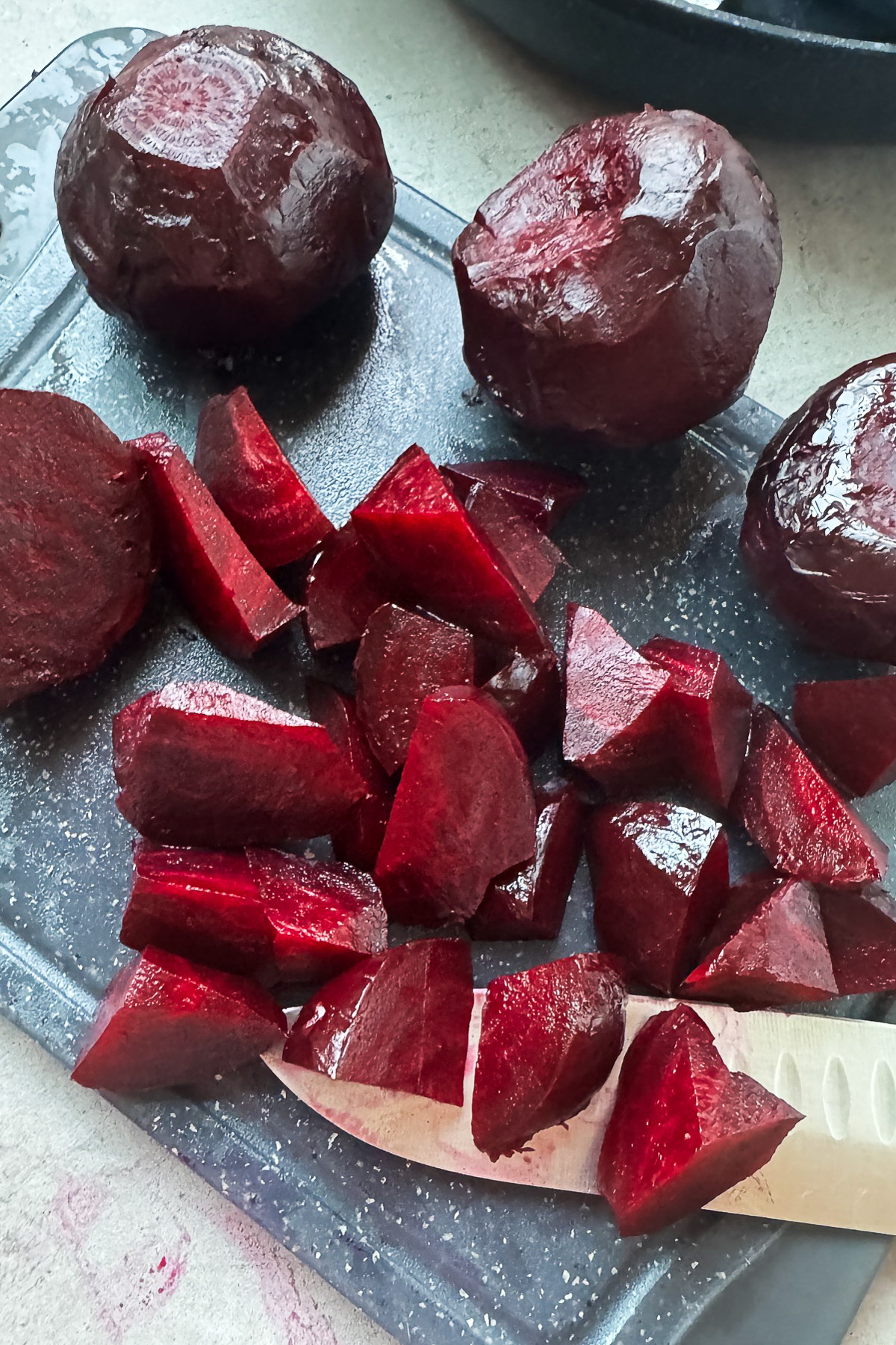 Roasted beets in foil cut into pieces