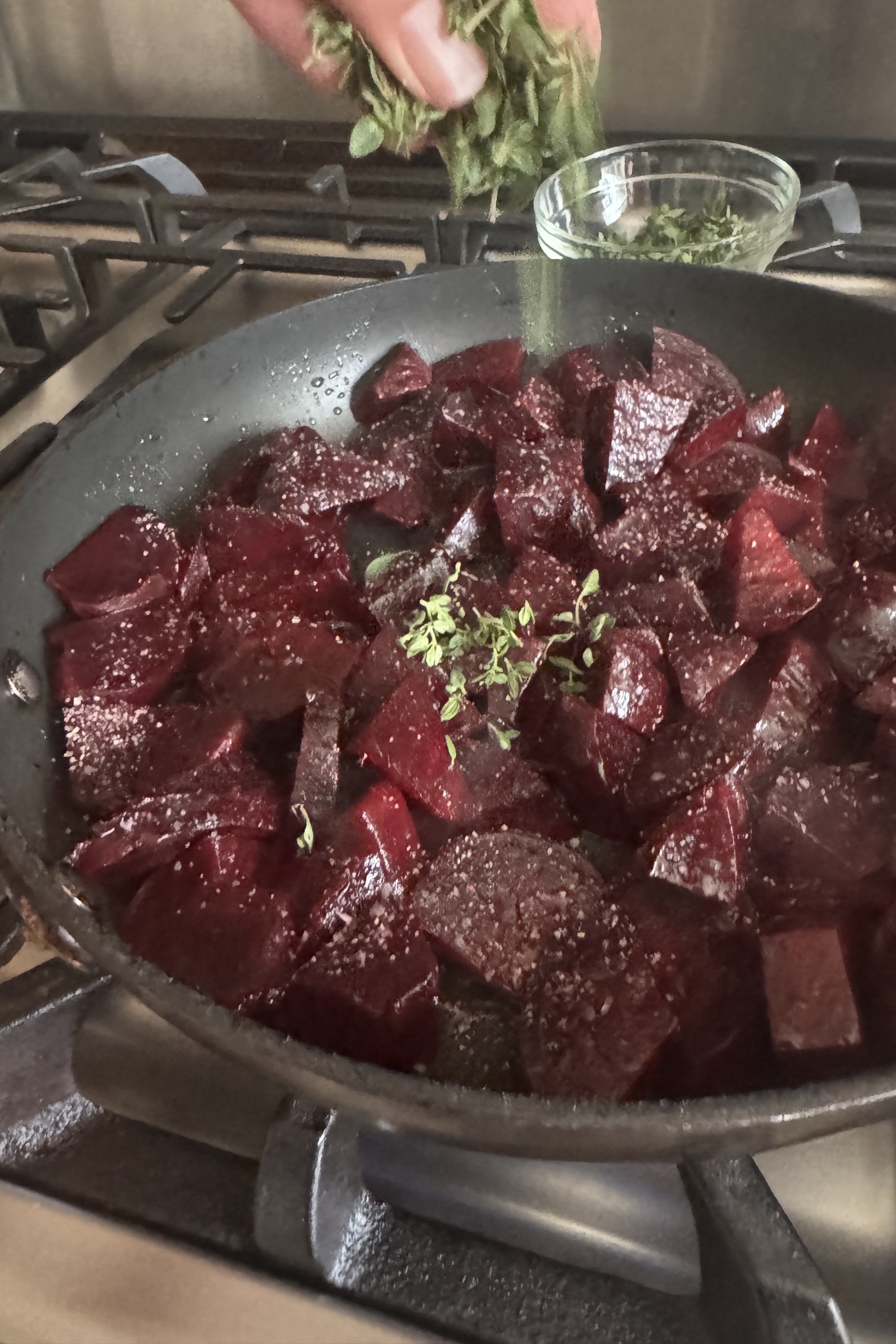 Searing red beets in skillet