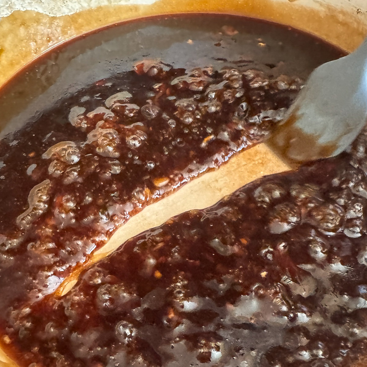 Simmer the shoyu braising liquid until it thickens into a glaze like sauce.